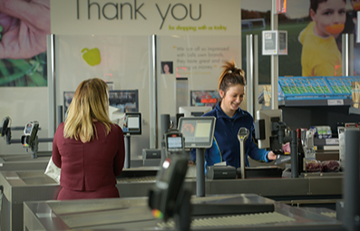 Lidl checkout staff and customer
